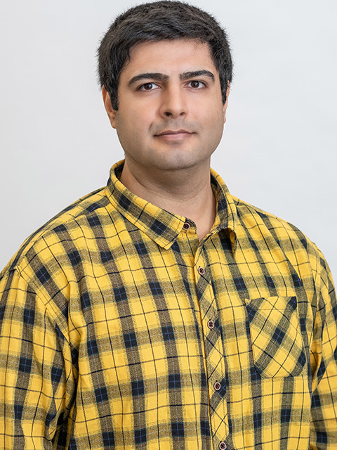 Portrait photograph of staff member, Babak Jamhiri